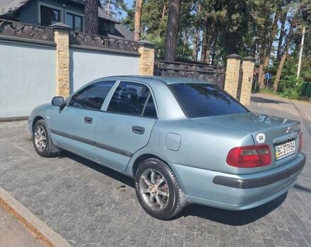 Серый Мицубиси Харизма, объемом двигателя 1.6 л и пробегом 286 тыс. км за 4800 $, фото 3 на Automoto.ua