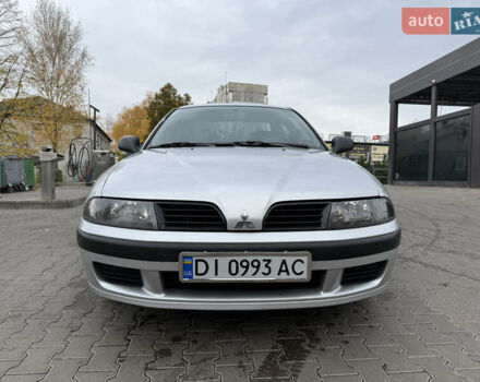 Серый Мицубиси Харизма, объемом двигателя 1.6 л и пробегом 184 тыс. км за 3900 $, фото 1 на Automoto.ua