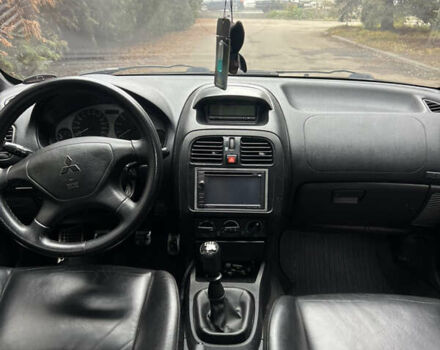 Серый Мицубиси Харизма, объемом двигателя 1.6 л и пробегом 267 тыс. км за 3700 $, фото 9 на Automoto.ua