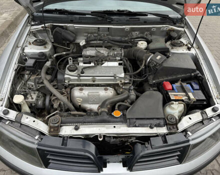 Серый Мицубиси Харизма, объемом двигателя 1.6 л и пробегом 184 тыс. км за 3900 $, фото 17 на Automoto.ua