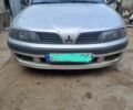Серый Мицубиси Харизма, объемом двигателя 0 л и пробегом 333 тыс. км за 2700 $, фото 1 на Automoto.ua