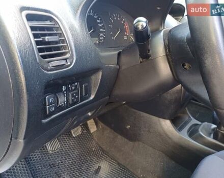 Сірий Міцубісі Харизма, об'ємом двигуна 1.6 л та пробігом 390 тис. км за 2800 $, фото 15 на Automoto.ua