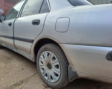 Серый Мицубиси Харизма, объемом двигателя 0 л и пробегом 333 тыс. км за 2700 $, фото 3 на Automoto.ua