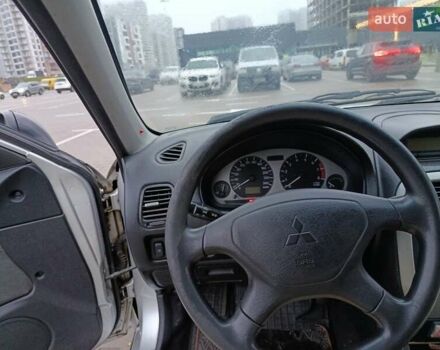 Сірий Міцубісі Харизма, об'ємом двигуна 1.6 л та пробігом 212 тис. км за 3700 $, фото 7 на Automoto.ua