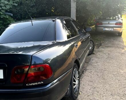 Серый Мицубиси Харизма, объемом двигателя 1.6 л и пробегом 0 тыс. км за 3200 $, фото 4 на Automoto.ua