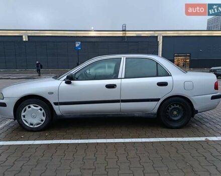 Сірий Міцубісі Харизма, об'ємом двигуна 1.6 л та пробігом 212 тис. км за 3700 $, фото 24 на Automoto.ua