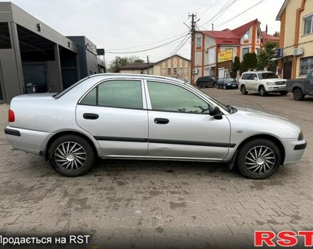 Міцубісі Харизма 2003 у Яготине на Automoto.ua Сірий Міцубісі Харизма, об'ємом двигуна 1.6 л та пробігом 184 тис. км за 3900 $, фото 7 на Automoto.ua
