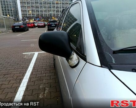 Серый Мицубиси Харизма, объемом двигателя 1.6 л и пробегом 212 тыс. км за 3700 $, фото 3 на Automoto.ua