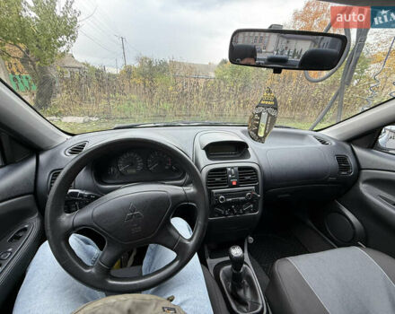 Міцубісі Харизма 2003 у Яготине на Automoto.ua Сірий Міцубісі Харизма, об'ємом двигуна 1.6 л та пробігом 184 тис. км за 3900 $, фото 11 на Automoto.ua