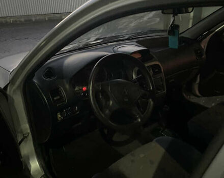 Серый Мицубиси Харизма, объемом двигателя 1.6 л и пробегом 300 тыс. км за 2800 $, фото 6 на Automoto.ua