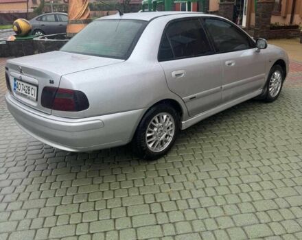 Сірий Міцубісі Харизма, об'ємом двигуна 1.6 л та пробігом 300 тис. км за 2900 $, фото 2 на Automoto.ua