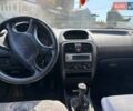Серый Мицубиси Харизма, объемом двигателя 1.6 л и пробегом 245 тыс. км за 2100 $, фото 2 на Automoto.ua