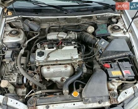 Сірий Міцубісі Харизма, об'ємом двигуна 1.6 л та пробігом 212 тис. км за 3700 $, фото 2 на Automoto.ua