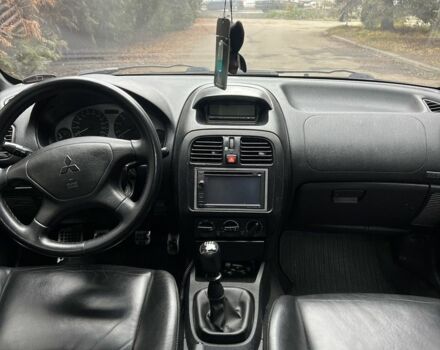 Сірий Міцубісі Харизма, об'ємом двигуна 1.6 л та пробігом 262 тис. км за 3700 $, фото 9 на Automoto.ua