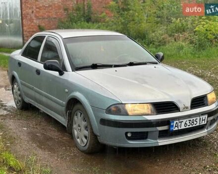 Сірий Міцубісі Харизма, об'ємом двигуна 1.6 л та пробігом 245 тис. км за 1700 $, фото 1 на Automoto.ua