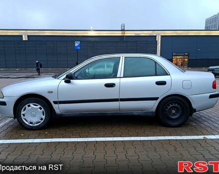 Серый Мицубиси Харизма, объемом двигателя 1.6 л и пробегом 212 тыс. км за 3700 $, фото 6 на Automoto.ua