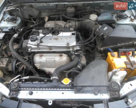 Сірий Міцубісі Харизма, об'ємом двигуна 1.6 л та пробігом 275 тис. км за 2450 $, фото 15 на Automoto.ua