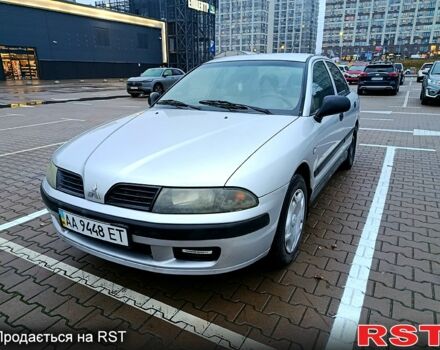 Серый Мицубиси Харизма, объемом двигателя 1.6 л и пробегом 212 тыс. км за 3700 $, фото 1 на Automoto.ua