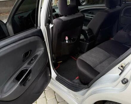 Сірий Міцубісі Харизма, об'ємом двигуна 1.83 л та пробігом 319 тис. км за 4500 $, фото 4 на Automoto.ua