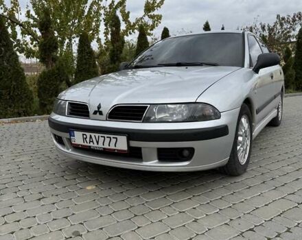 Сірий Міцубісі Харизма, об'ємом двигуна 1.83 л та пробігом 319 тис. км за 4500 $, фото 1 на Automoto.ua