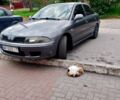 Сірий Міцубісі Харизма, об'ємом двигуна 1.6 л та пробігом 150 тис. км за 3800 $, фото 1 на Automoto.ua