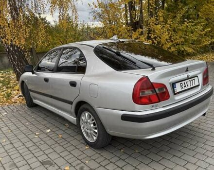 Сірий Міцубісі Харизма, об'ємом двигуна 1.83 л та пробігом 319 тис. км за 4500 $, фото 5 на Automoto.ua