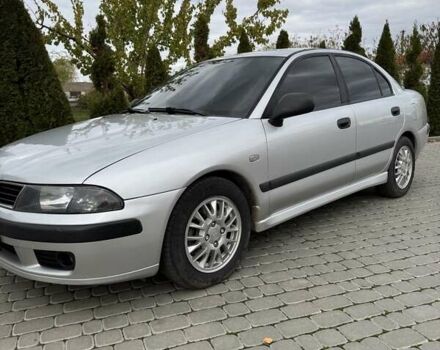 Сірий Міцубісі Харизма, об'ємом двигуна 1.83 л та пробігом 319 тис. км за 4500 $, фото 2 на Automoto.ua