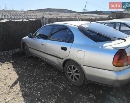 Сірий Міцубісі Харизма, об'ємом двигуна 1.8 л та пробігом 300 тис. км за 1800 $, фото 3 на Automoto.ua