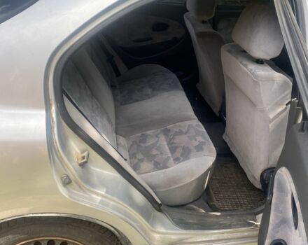 Серый Мицубиси Харизма, объемом двигателя 1.8 л и пробегом 202 тыс. км за 1100 $, фото 5 на Automoto.ua