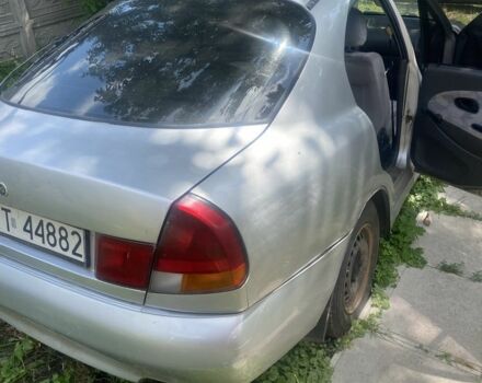 Серый Мицубиси Харизма, объемом двигателя 1.8 л и пробегом 202 тыс. км за 1100 $, фото 3 на Automoto.ua