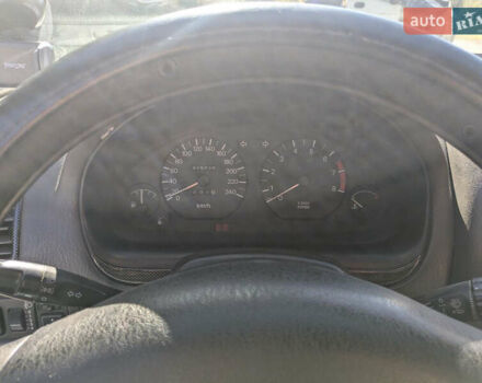 Серый Мицубиси Харизма, объемом двигателя 1.83 л и пробегом 415 тыс. км за 1999 $, фото 5 на Automoto.ua