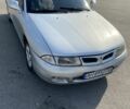Серый Мицубиси Харизма, объемом двигателя 1.8 л и пробегом 251 тыс. км за 2000 $, фото 3 на Automoto.ua