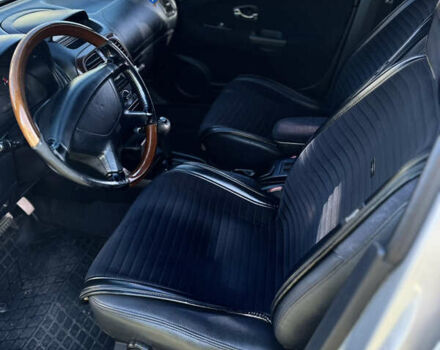 Сірий Міцубісі Харизма, об'ємом двигуна 1.83 л та пробігом 258 тис. км за 4200 $, фото 16 на Automoto.ua