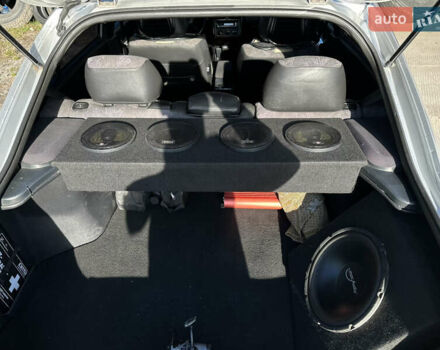 Сірий Міцубісі Харизма, об'ємом двигуна 1.83 л та пробігом 258 тис. км за 4200 $, фото 18 на Automoto.ua