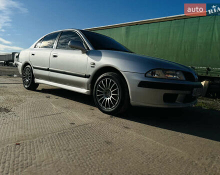 Сірий Міцубісі Харизма, об'ємом двигуна 1.83 л та пробігом 258 тис. км за 4200 $, фото 2 на Automoto.ua