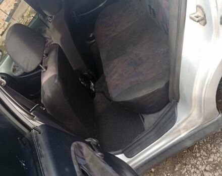 Серый Мицубиси Харизма, объемом двигателя 1.9 л и пробегом 65 тыс. км за 1650 $, фото 5 на Automoto.ua