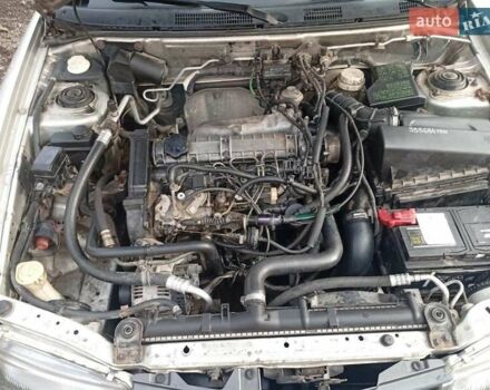 Серый Мицубиси Харизма, объемом двигателя 1.9 л и пробегом 65 тыс. км за 1650 $, фото 10 на Automoto.ua