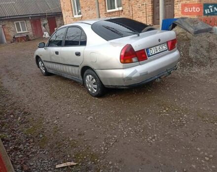 Серый Мицубиси Харизма, объемом двигателя 1.9 л и пробегом 65 тыс. км за 1650 $, фото 14 на Automoto.ua