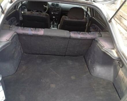 Серый Мицубиси Харизма, объемом двигателя 1.9 л и пробегом 65 тыс. км за 1650 $, фото 3 на Automoto.ua