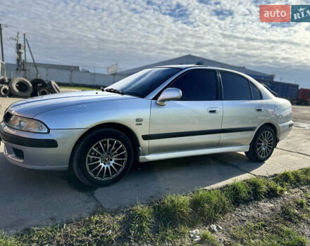 Сірий Міцубісі Харизма, об'ємом двигуна 1.83 л та пробігом 258 тис. км за 4200 $, фото 5 на Automoto.ua