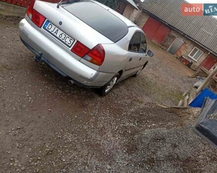 Серый Мицубиси Харизма, объемом двигателя 1.9 л и пробегом 65 тыс. км за 1650 $, фото 8 на Automoto.ua