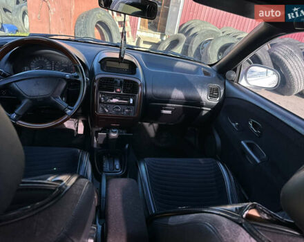 Сірий Міцубісі Харизма, об'ємом двигуна 1.83 л та пробігом 258 тис. км за 4200 $, фото 17 на Automoto.ua