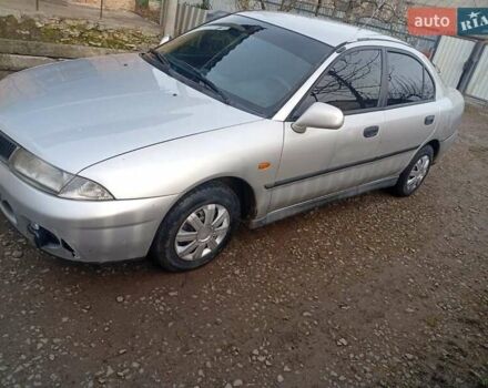 Серый Мицубиси Харизма, объемом двигателя 1.9 л и пробегом 65 тыс. км за 1650 $, фото 18 на Automoto.ua