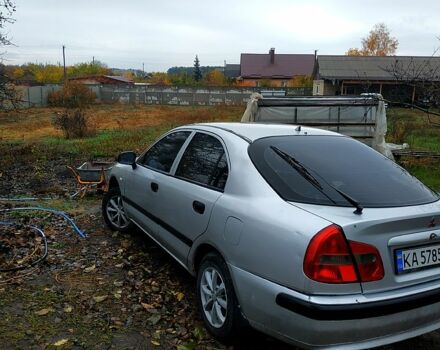 Сірий Міцубісі Харизма, об'ємом двигуна 1.6 л та пробігом 330 тис. км за 2000 $, фото 4 на Automoto.ua