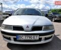 Серый Мицубиси Харизма, объемом двигателя 1.6 л и пробегом 380 тыс. км за 2200 $, фото 2 на Automoto.ua