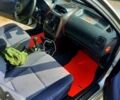 Серый Мицубиси Харизма, объемом двигателя 1.8 л и пробегом 380 тыс. км за 3150 $, фото 1 на Automoto.ua