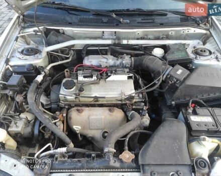 Сірий Міцубісі Харизма, об'ємом двигуна 1.6 л та пробігом 527 тис. км за 2200 $, фото 24 на Automoto.ua