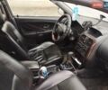 Сірий Міцубісі Харизма, об'ємом двигуна 1.8 л та пробігом 368 тис. км за 1500 $, фото 5 на Automoto.ua