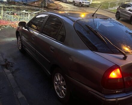 Серый Мицубиси Харизма, объемом двигателя 1.8 л и пробегом 377 тыс. км за 1182 $, фото 3 на Automoto.ua