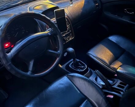 Серый Мицубиси Харизма, объемом двигателя 1.8 л и пробегом 377 тыс. км за 1182 $, фото 7 на Automoto.ua